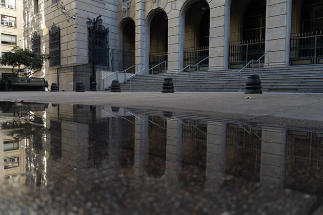 March 27, 2021, Santiago, Metropolitana, Chile: An empty street is reflected in a pool of water, on the first day of total quarantine in Santiago de Chile. Santiago Chile - ZUMAb332 20210327_zip_b332_006 Copyright: xMatiasxBasualdox