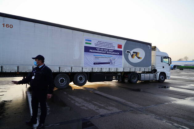 (210327) -- TASHKENT, March 27, 2021 -- A truck is seen to transport COVID-19 vaccines at Tashkent International Airport in Tashkent, Uzbekistan, on March 27, 2021. The first batch of Chinese coronavirus vaccines arrived in Uzbekistan Saturday. (Photo by Xinhua) UZBEKISTAN-TASHKENT-CHINA-COVID-19 VACCINES-ARRIVAL ZafarxKhalilov 