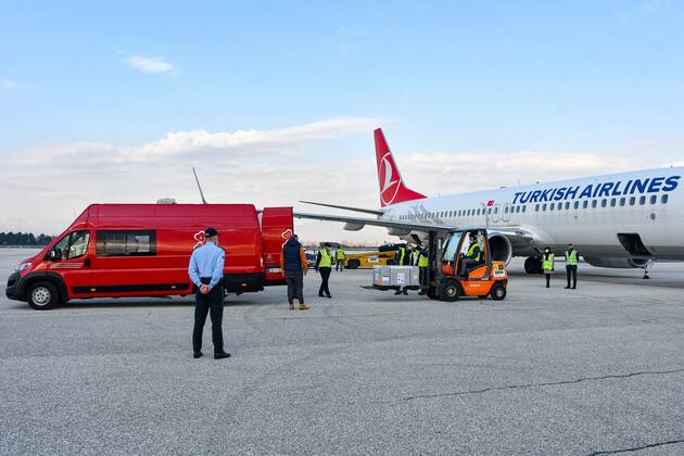 (210328) -- SKOPJE, March 28, 2021 -- Workers load North Macedonia s first batch of AstraZeneca s COVID-19 vaccines received through the UN-backed Covax program, at Skopje s International Airport in Skopje, North Macedonia, March 28, 2021. (Photo by Xinhua) NORTH MACEDONIA-SKOPJE-COVID-19-VACCINE TomislavxGeorgiev 