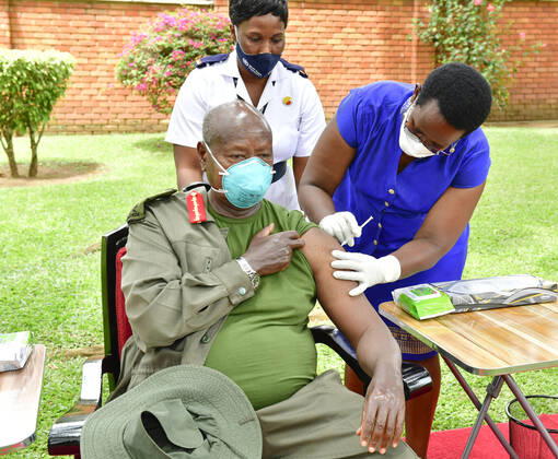 (210328) -- KAMPALA, March 28, 2021 -- Ugandan President Yoweri Museveni receives the COVID-19 vaccine at State House in Kampala, Uganda, on March 27, 2021. Ugandan President Yoweri Museveni and his wife Janet Museveni received their first dose of the Oxford-AstraZeneca vaccines here on Saturday. (Photo by Xinhua) UGANDA-KAMPALA-PRESIDENT-COVID-19 VACCINATION JosephxKiggundu 