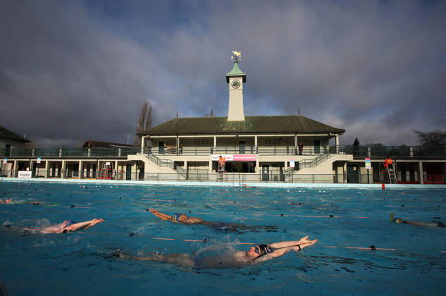 Swimmers enjoying the first dip in the Peterborough Lido for over a year, as it has been unable to open since the first lockdown in March 2020. Peterborough Lido was first opened in 1936 and still retains the art deco look to this day. Today lockdown restrictions are starting to ease and outdoor sports like swimming and tennis, with people also being allowed to take part in organised outdoor sports, and outdoor gatherings of up to six people or a larger group from up to two households will be permissible. 