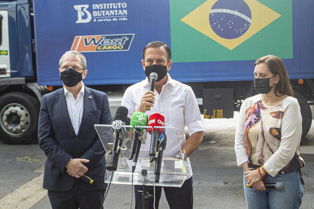 Delivery of CORONAVAC Vaccine to Brazilian ministry of health. March 29, 2021, Sao Paulo, Brazil: The Governor of Sao Paulo, Joao Doria participates in a ceremony for the delivery of over 5 million doses of the Butantan Institute vaccine against the coronavirus for the use in Brazil. It is the largest single-day shipment made available in March. This month alone, 19.3 million doses have so far been delivered. With the new shipment, the total number of immunizations offered by Sao Paulo to the PNI (National Immunization Program) reaches 32.8 million doses since the start of deliveries on January 17th  Copyright: xLecoxVianax