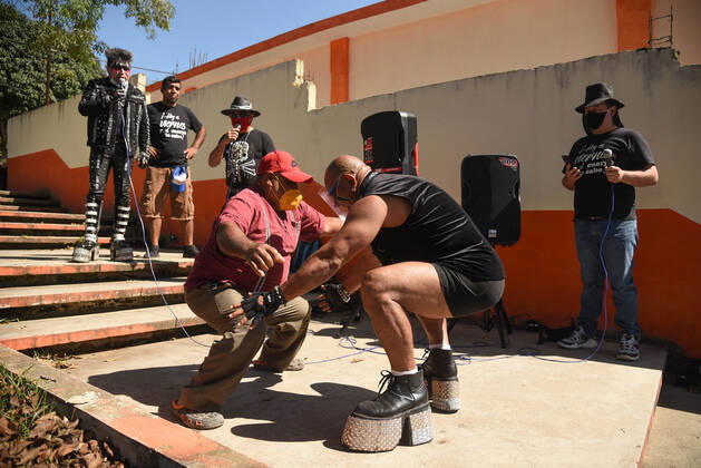 March 30, 2021, Tuzamapan, Veracruz, Mo xico: The musical group Los super Caracoles plays their songs while older adults wait in line to be vaccinated against Covid-19. Some older adults joined the dance and celebration to receive the vaccine Tuzamapan MÃ xico - ZUMAqp1_ 20210330_zip_qp1_014 Copyright: xHectorxAdolfoxQuintanarxPerezx
