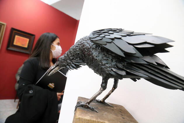 (210330) -- ANKARA, March 30, 2021 -- A woman wearing a face mask visits an international contemporary art fair in Ankara, Turkey, on March 30, 2021. (Photo by Xinhua) TURKEY-ANKARA-INTERNATIONAL CONTEMPORARY ART FAIR MustafaxKaya 