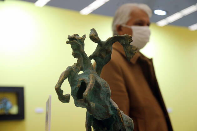 (210330) -- ANKARA, March 30, 2021 -- A man wearing a face mask visits an international contemporary art fair in Ankara, Turkey, on March 30, 2021. (Photo by Xinhua) TURKEY-ANKARA-INTERNATIONAL CONTEMPORARY ART FAIR MustafaxKaya 