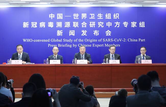 (210331) -- BEIJING, March 31, 2021 -- Chinese expert members of a WHO-China joint team introduce the report on the WHO-convened global study of COVID-19 origins at a press briefing in Beijing, capital of China, March 31, 2021. ) CHINA-BEIJING-WHO-COVID-19-ORIGINS-STUDY-PRESS BRIEFING (CN) ZhangxYuwei 