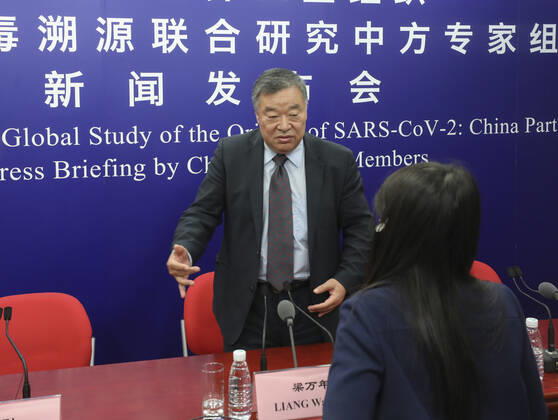 (210331) -- BEIJING, March 31, 2021 -- Liang Wannian, team leader from the Chinese side of the WHO-China team studying the origins of COVID-19, answers questions after a press briefing by the Chinese expert members of the joint study in Beijing, capital of China, March 31, 2021. ) CHINA-BEIJING-WHO-COVID-19-ORIGINS-STUDY-PRESS BRIEFING (CN) ZhangxYuwei 