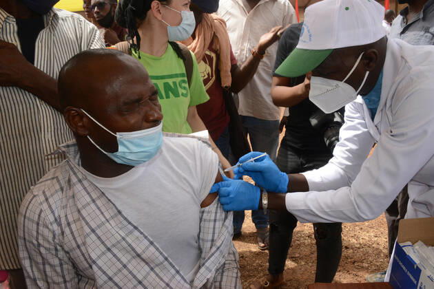 (210331) -- BAMAKO, March 31, 2021 -- A man receives the COVID-19 vaccine in Bamako, Mali, on March 31, 2021. Malian Minister of Health and Social Development Fanta Siby received Wednesday her first dose of COVID-19 vaccine, which symbolized the official kickoff of Mali s COVID-19 vaccination campaign. During this first phase of the vaccination campaign, according to the minister, a total of 21,406 health workers will be vaccinated in Bamako, epicenter of the pandemic in this West African country. (Photo by Xinhua) MALI-BAMAKO-COVID-19-VACCINATION HabibxKouyate 