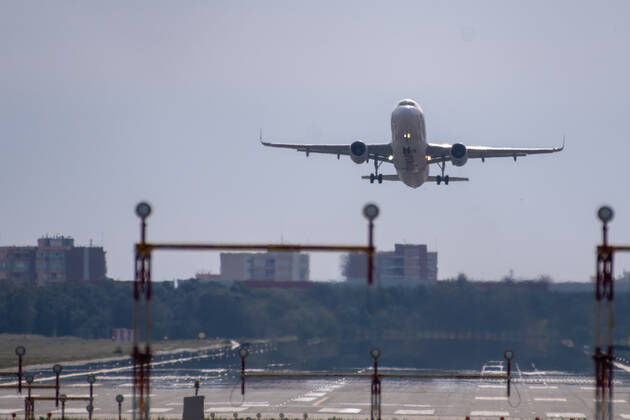 20210401 Tourists arrive at Palma de Mallorca Airport PALMA, SPAIN - APRIL 1 2021 : Germanwings Airplane at - Tourists arrive at Palma de Mallorca Airport on April 1, 2021 in Palma, .