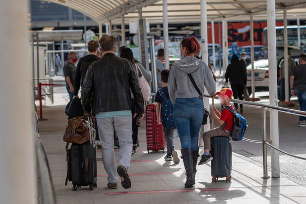 20210401 Tourists arrive at Palma de Mallorca Airport PALMA, SPAIN - APRIL 1 2021 : Tourists at Palma de Mallorca Ariport at - Tourists arrive at Palma de Mallorca Airport on April 1, 2021 in Palma, .