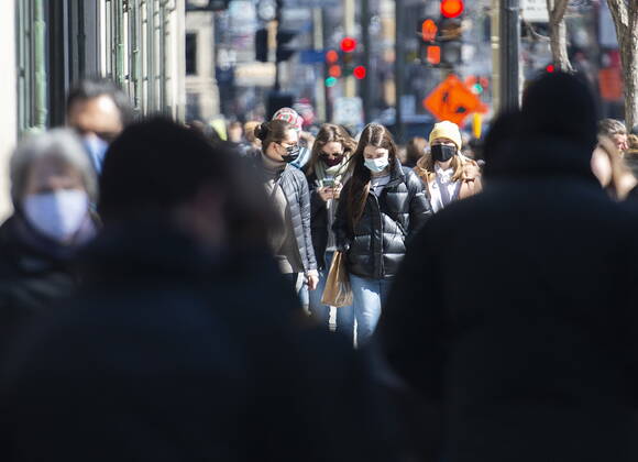 April 2, 2021, Montreal, PQ, Canada: People wear face masks as they walk along a street in Montreal, Friday, April 2, 2021, as the COVID-19 pandemic continues in Canada and around the world. Montreal Canada - ZUMAc35_ 20210402_zaf_c35_006 Copyright: xGrahamxHughesx