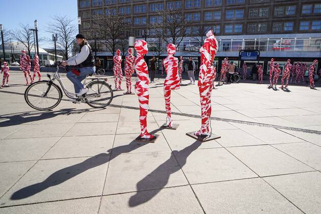 (210403) -- BERLIN, April 3, 2021 -- Mannequins wrapped in warning tapes are displayed at the memorial installation It is like it is to show separations caused by the COVID-19 pandemic and call on people to value everything around them more at Alexanderplatz in Berlin, capital of Germany, April 2, 2021. (Photo by Xinhua) GERMANY-BERLIN-MEMORIAL INSTALLATION- IT IS LIKE IT IS StefanxZeitz 