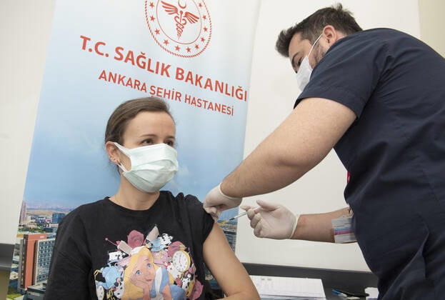 A woman receives the Pfizer BioNTech COVID-19 vaccine in Ankara City Hospital, Turkey, on April 3, 2021. Turkey has confirmed 31,892 deaths and 3,400,296 positive cases of the coronavirus infection in the country. ( Copyright: AbdurrahmanxAntakyalix-xDepoxPho DSC_4285