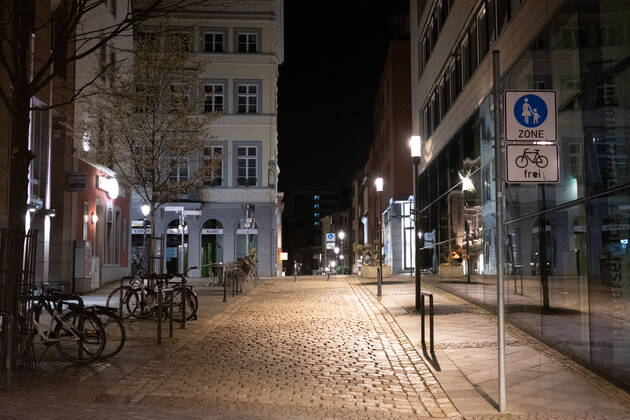 Like an abandoned city. Aachen on Easter vigil between 10 p.m. and 11 p.m. View into the deserted pedestrian zone Rennbahn-Strasse. In Aachen on April 3, 2021. GERMANY - AACHEN - EASTER Easter 2021 Covid Pandemic