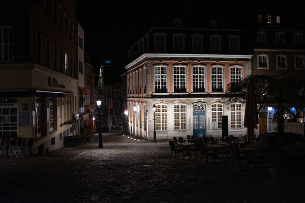 Like an abandoned city. Aachen on Easter vigil between 10 p.m. and 11 p.m. The brightly lit Couven Museum stands out from the dark alleys, in Aachen on April 3, 2021. GERMANY - AACHEN - EASTER Easter 2021 Covid Pandemic
