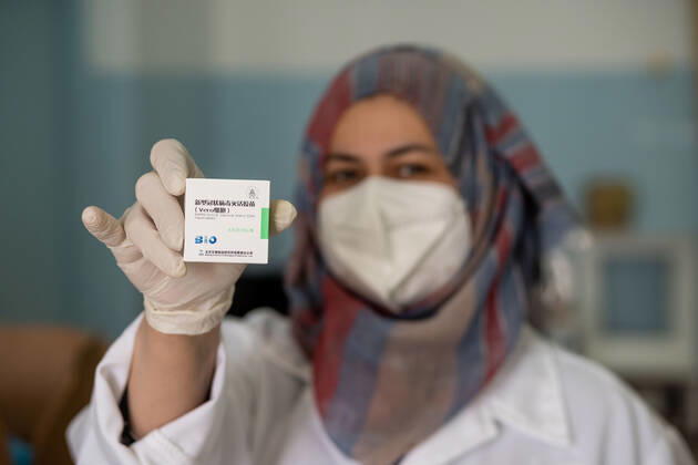 (210406) -- BETHLEHEM, April 6, 2021 -- A Palestinian medical worker shows the Sinopharm COVID-19 vaccine at a medical center during a vaccination campaign launched by the health ministry in the West Bank city of Bethlehem, April 6, 2021. (Photo by Xinhua) MIDEAST-BETHLEHEM-VACCINATION-COVID-19 LuayxSababa