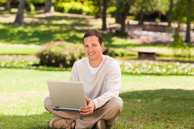Man working on his laptop in the park Man working on his laptop in the park during the summer, model released, Cape Town, South Africa, 16.11.2010, 59517.jpg, attractive, carefree, garden, green, greenery, handsome, happiness, happy, leisure, lifestyle, outdoor, outside, park, relax, relaxation, smile, summer, smiling, tree, sit, sitting, pose, posing, looking, technology, communication, laptop, notebook, internet, using, working 30s, Mid Adult, Man, Male, Caucasian, Caucasian Appearance, 30-34 Years, Mid Adult Men Outdoors