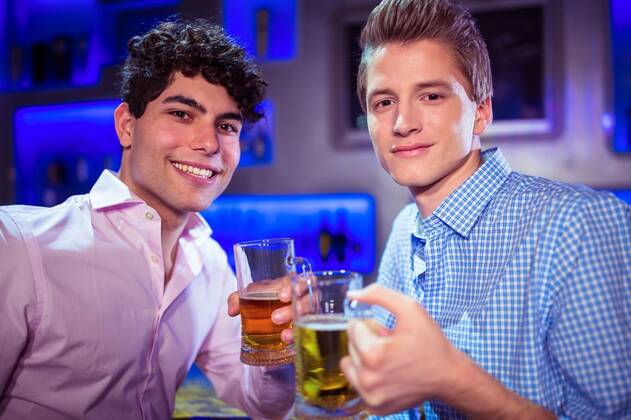 Portrait of smiling friends enjoying alcohol Portrait of smiling men enjoying alcohol at nightlcub, model released, , property released, Prague, Czech Republic, 07.04.2016, 773950.jpg, looking, lifestyle, leisure, casual clothing, party, celebration, fun, clubbing, event, stylish, bar, pub, nightclub, nightlife, drunk, disco, youth culture, club, youthful, beer, beer glass, glass, alcohol, cool, entertainment, bar counter, drink, holding, refreshment, freshness, food and drink, enjoying, entertainment club, bonding, friends, socializing, together, friendship, weekend, drinking, smiling, happiness, happy hour, meeting up Indoors,Front view,Portrait,Looking at camera,Head and shoulders