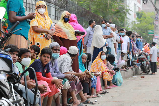 April 10, 2021, Dhaka, Dhaka, Bangladesh: April, 10, 2021 People wait in a line to buy government subsidize goods from a TCB truck in Dhaka, Dhaka Bangladesh - ZUMAr338 20210410_zip_r338_002 Copyright: xHarun-Or-Rashidx