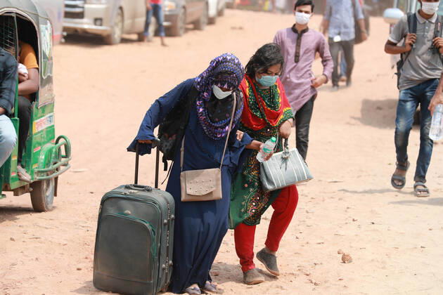 April 13, 2021, Dhaka, Dhaka, Bangladesh: April,13, 2021 People begin leaving Dhaka ahead of a new lockdown set to be enforced with stricter rules. A rush of homebound passengers is seen at the Shimulia ferry terminal Dhaka Bangladesh - ZUMAr338 20210413_zip_r338_077 Copyright: xHarun-Or-Rashidx
