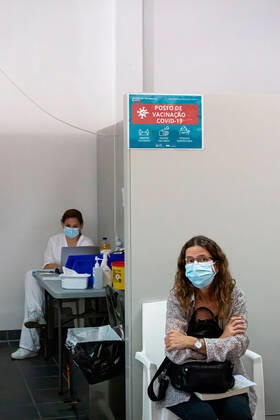 April 17, 2021, Matosinhos, Porto, Portugal: A woman wearing a facemask as a precaution against the spread of covid-19 waits outside a vaccination booth..The nationwide mass vaccination of teachers and school staff started on 17th April in the Matosinhos Vaccination Centre, 1952 people were vaccinated on the first Saturday with Cominarty vaccine produced by Pfizer. Matosinhos Portugal - ZUMAs197 20210417_zaa_s197_263 Copyright: xTeresaxNunesx
