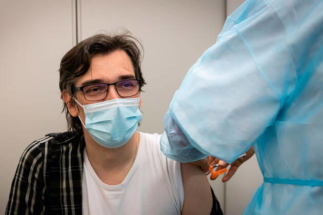 April 17, 2021, Matosinhos, Porto, Portugal: Teacher Ricardo Campos, is being vaccinated with Cominarty, produced by Pfizer vaccine..The nationwide mass vaccination of teachers and school staff started on 17th April in the Matosinhos Vaccination Centre, 1952 people were vaccinated on the first Saturday with Cominarty vaccine produced by Pfizer. Matosinhos Portugal - ZUMAs197 20210417_zaa_s197_264 Copyright: xTeresaxNunesx