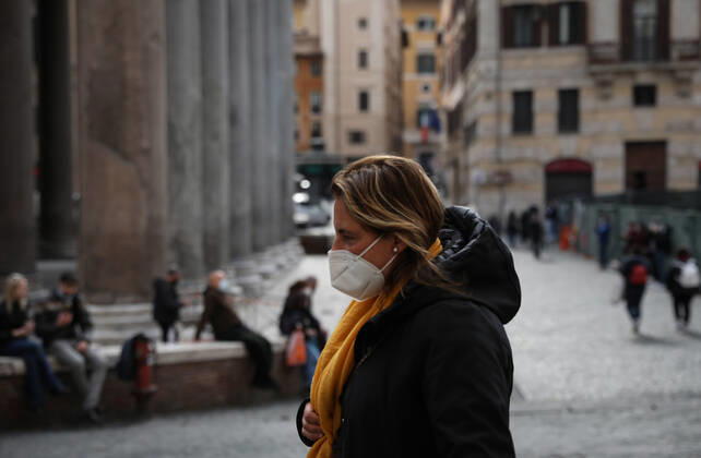 (210422) -- ROME, April 22, 2021 -- A woman wearing a face mask walks past the Pantheon in Rome, Italy, April 21, 2021. Prime Minister Mario Draghi s cabinet on Wednesday unveiled a roadmap for easing COVID-19 restrictions in Italy starting from April 26. The move came as the pandemic appears moderately under control in the country, with active coronavirus cases falling. ) ITALY-ROME-COVID-19-REOPENING SOON ChengxTingting