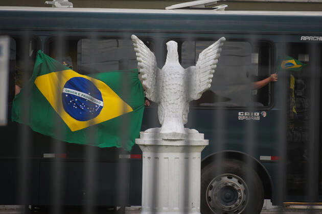BELÉM, PA - 23.04.2021: BOLSONARO ENTREGA ALIMENTOS EM BELÉM - President Jair Bolsonaro (without a party) delivers food this Friday (23) in Belém do Pará. The event takes place at Belém Air Force Base and is part of the Brasil Fraterno initiative, which aims to serve needy families in regions of social crisis. Supporters of President Bolsonaro threaten journalists in front of the venue. x2057156x  FilipexBispo