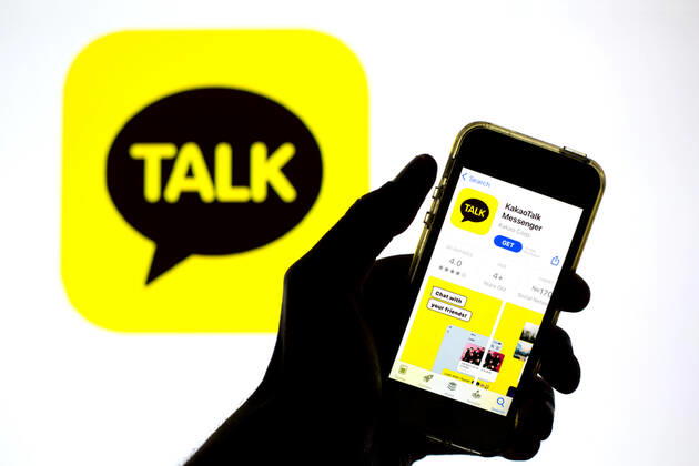 April 30, 2021, Barcelona, Catalonia, Spain: In this photo illustration, the KakaoTalk app in App Store seen displayed on a smartphone screen and a KakaoTalk logo in the background. Barcelona Spain - ZUMAd159 20210430_zia_d159_026 Copyright: xThiagoxPrudenciox