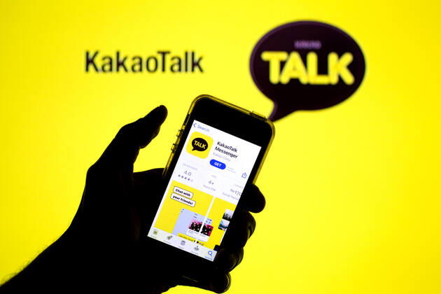 April 30, 2021, Barcelona, Catalonia, Spain: In this photo illustration, the KakaoTalk app in App Store seen displayed on a smartphone screen and a KakaoTalk logo in the background. Barcelona Spain - ZUMAd159 20210430_zia_d159_027 Copyright: xThiagoxPrudenciox