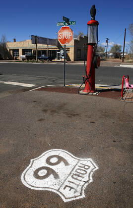 United States, 2010: the historic Route 66 (also known as Will Rogers Highway, Main Street of America or the Mother Road) United States, 2010: the historic Route 66, originally ran from Chicago (Illinois) to Los Angeles (California) between 1926 and 1985. The highway no longer have an official existence but remains one of the most famous roads in America. Route 66 crosses 3 time zones and 8 states and one can still find Historic Route 66 signs along the highway. Logo painted on the ground of a gas station with an old fuel pump  Copyright: xDuboisxCh Andia.frx 211469