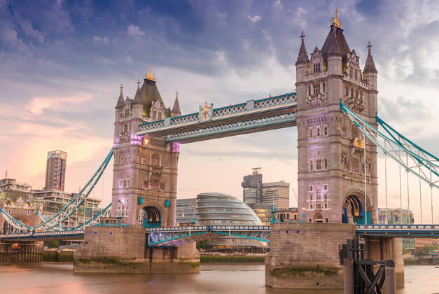 The Tower Bridge at sunset wity London riverside on background. Copyright: xx 19228694