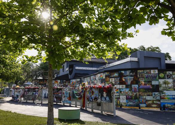 April 28, 2021, Orlando, Florida, USA: The sun peaks through the trees as photos, sayings, and tributes are seen outside of Pulse Wednesday, April 28, 2021 in Orlando. On June 12, 2016 29 year-old Omar Mateen walked into the popular night club and killed 49 people and injured more than 50. The club has become a place for visitors to reflect on the tragic shooting. Orlando USA - ZUMAs70_ 20210428_zan_s70_032 Copyright: xChrisxUrsox