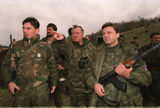 June 8, 2021: Former Bosnian Serb commander Ratko Mladic has lost his appeal against a 2017 conviction for genocide, war crimes and crimes against humanity. The UN court upheld the life sentence for his role in the killing of around 8,000 Bosnian Muslim (Bosniak) men and boys in Srebrenica in 1995. The massacre, in an enclave supposed to be under UN protection, was the worst atrocity in Europe since World War Two. FILE IMAGE SHOT ON: April 16, 1994, Gorazde, Bosnia and Herzegovina: Former Serb Army Commander RATKO MLADIC, right, near the town of Gorazde during the Bosnian War. Gorazde Bosnia and Herzegovina - ZUMAs107 19940416_jas_s107_002 Copyright: xDraganxStankovichx