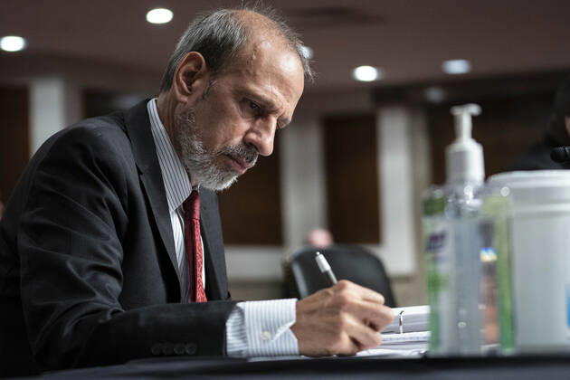 Under Secretary of Defense and chief financial officer Michael McCord, writes notes during a Senate Armed Services Committee hearing at the U.S. Capitol in Washington DC, on Thursday, June 10, 2021. The committee heard testimony on the Defense Department budget posture in review of the Defense Authorization Request for FY2022.  WAP20210610579 SARAHxSILBIGER