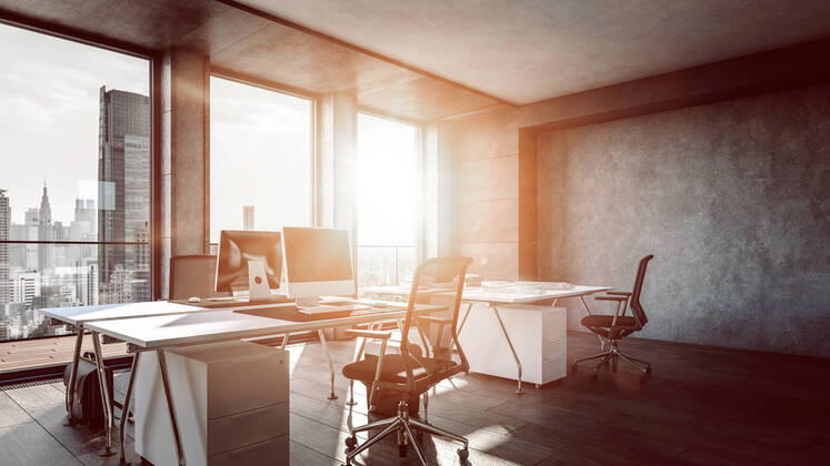 Interior of office with sunlight streaming through window property released SKGF00025