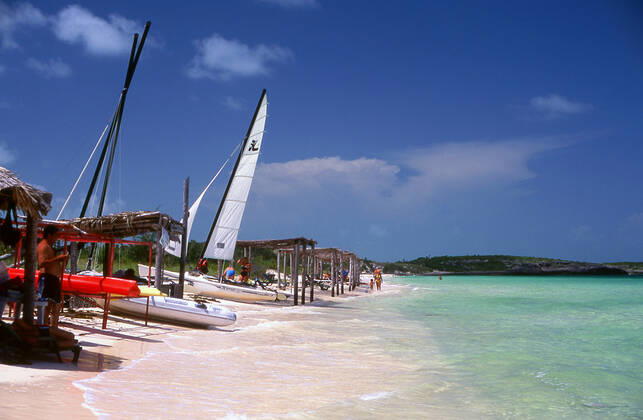 Cayo Coco, used as a hideout by buccaneers in the early colonial period, was home to a small settlement of fishermen and charcoal producers until 1955, when the freshwater supply was exhausted and the market for charcoal ended with the spread of electrification after the Cuban Revolution. A causeway connecting the island to the Cuban mainland opened on 26 July 1988, and resort construction began. Cuba: Cayo Coco, Jardines del Rey (Gardens of the King), Ciego de Avila Province xCPAxMediaxCo.xLtd.x Copyright: xDavidxHenleyx