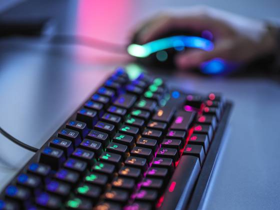 IMAGO Creative, Lifestyle, Gaming Gaming keyboard with illuminated keypad on table model released Symbolfoto property released ABRF00898