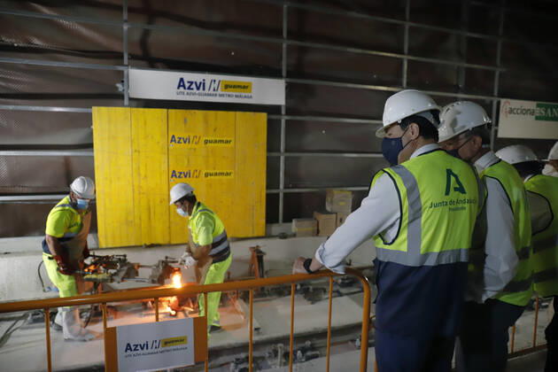 The president of the Junta de Andalucia, Juanma Moreno (c), attends the first welding of the track rail at the Atarazanas metro station. On 26 July 2021, in Malaga (Andalusia, Spain). 26 JULY 2021;PIXELATED Ãlex Zea LagenciaEP 07 26 2021 Malaga (Andalusia) Malaga (Andalusia) Spain Copyright: xÃlexxZeax 3856043