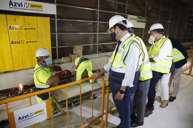 The president of the Junta de Andalucia, Juanma Moreno (c), attends the first welding of the track rail at the Atarazanas metro station. On 26 July 2021, in Malaga (Andalusia, Spain). 26 JULY 2021;PIXELATED Ãlex Zea LagenciaEP 07 26 2021 Malaga (Andalusia) Malaga (Andalusia) Spain Copyright: xÃlexxZeax 3856044