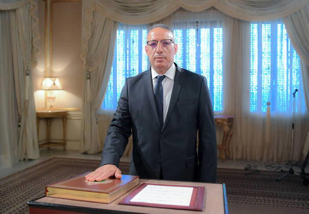 Bilder des Jahres 2021, News 07 Juli News Themen der Woche KW30 News Bilder des Tages (210729) -- TUNIS, July 29, 2021 -- Ridha Gharsallaoui takes the constitutional oath as Tunisian interior minister during an inauguration ceremony in Tunis, Tunisia, on July 29, 2021. Kais Saied has appointed Ridha Gharsallaoui as the new interior minister, the presidency said on Thursday. ( Handout via Xinhua) TUNISIA-TUNIS-PRESIDENT-NEW INTERIOR MINISTER TunisianxPresidency 