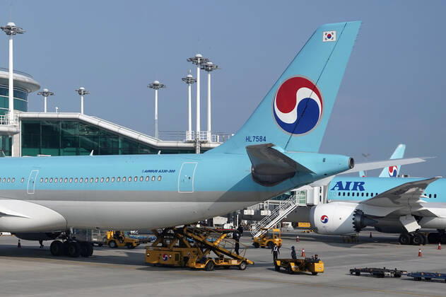 Korean Airline INCHEON, SOUTH KOREA, AUG 10: Koran Airline passenger jets are parked in Incheon Intenational Airport on August 10, 2021. Tokyo Japan 6909_245943 Copyright: xSeokyongxLee PentaxPressx