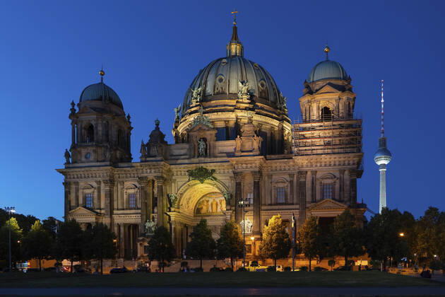 Germany, Berlin, Facade of Berlin Cathedral at night with Berlin Television Tower in background ABOF00716