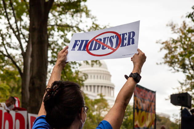 3-day relay for voting rights ends with rally at US Capitol A demonstrator holds a sign demanding elimination of the filibuster during a rally at the end of a relay for voting rights at the US Capitol. Protesters began the relay in West Virginia and walked or biked for the 3 days to the US Capitol. Protesters are demanding that Congress pass legislation protecting the right to vote for all Americans. Washington District of Columbia United States Copyright: xAllisonxBaileyx bailey-3dayrela211023_npWB8