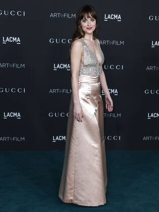10th Annual LACMA Art + Film Gala 2021 Actress Dakota Johnson wearing a Gucci outfit arrives at the 10th Annual LACMA Art + Film Gala 2021 held at the Los Angeles County Museum of Art on November 6, 2021 in Los Angeles, California, United States. Los Angeles California United States Copyright: xImagexPressxAgencyx collin-10thannu211106_npPoZ