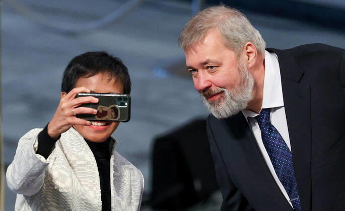 OSLO, NORWAY â€“ DECEMBER 10, 2021: Filipino-American journalist, co-founder and CEO of Rappler Maria Ressa (L) and Russian journalist, Novaya Gazeta editor-in-chief Dmitry Muratov pose for a selfie before the start of the 2021 Nobel Peace Prize award ceremony at Oslo City Hall. The Norwegian Nobel Committee has decided to award the Nobel Peace Prize for 2021 to Maria Ressa and Dmitry Muratov in recognition of their efforts to safeguard freedom of expression, which is a precondition for democracy and lasting peace . Sergei Bobylev TASS  TS11B5A3