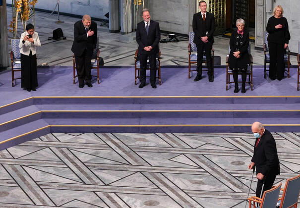 OSLO, NORWAY â€“ DECEMBER 10, 2021: King Harald V of Norway (R front) and Filipino-American journalist co-founder and CEO of Rappler Maria Ressa (L back), Russian journalist, Novaya Gazeta editor-in-chief Dmitry Muratov (2nd L back) and World Food Programme Executive Director David Beasley (3rd L back) are seen during the 2021 Nobel Peace Prize award ceremony at Oslo City Hall. The Norwegian Nobel Committee has decided to award the Nobel Peace Prize for 2021 to Philipino-American journalist Maria Ressa and Russian journalist Dmitry Muratov in recognition of their efforts to safeguard freedom of expression, which is a precondition for democracy and lasting peace . Sergei Bobylev TASS  TS11B5BE
