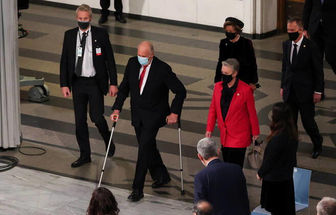 OSLO, NORWAY â€“ DECEMBER 10, 2021: King Harald V of Norway and Norwegian Nobel Committee Chairwoman Berit Reiss-Andersen (L-R centre midground) arrive for the 2021 Nobel Peace Prize award ceremony at Oslo City Hall. The Norwegian Nobel Committee has decided to award the Nobel Peace Prize for 2021 to Philipino-American journalist Maria Ressa and Russian journalist Dmitry Muratov in recognition of their efforts to safeguard freedom of expression, which is a precondition for democracy and lasting peace . Sergei Bobylev TASS  TS11B5BD