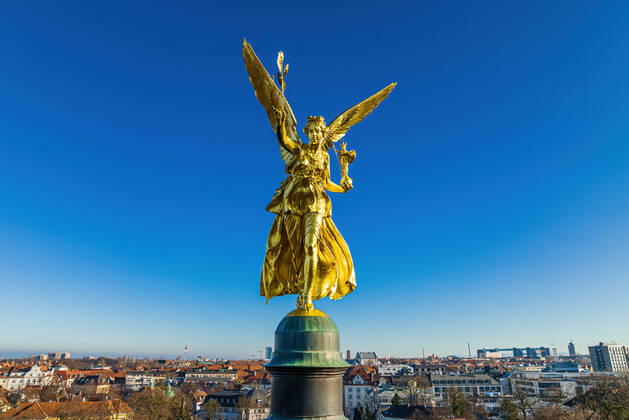 The Friedensengel overlooking Munich. Aerial view of the Friedensengel with the cityscape behind. Munich Germany