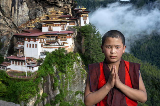 Monk in the Taktsang Goemba or Tigers nest monastery in Paro valley, Bhutan, Asia. Paro Taktsang or Taktsang Palphug Monastery and the Tiger s Nest is a prominent Himalayan Buddhist sacred site and the temple complex is located in the cliffside of the upper Paro valley in Bhutan. A temple complex was first built in 1692, around the Taktsang Senge Samdup cave where Guru Padmasambhava is said to have meditated for three years, three months, three weeks, three days and three hours in the 8th century. Bhutan Copyright: xSergixReboredox SRE-001-EG8569